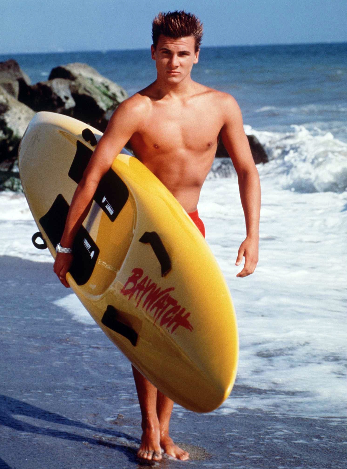 Jeremy Jackson as Hobie Buchannon in Baywatch surfboard