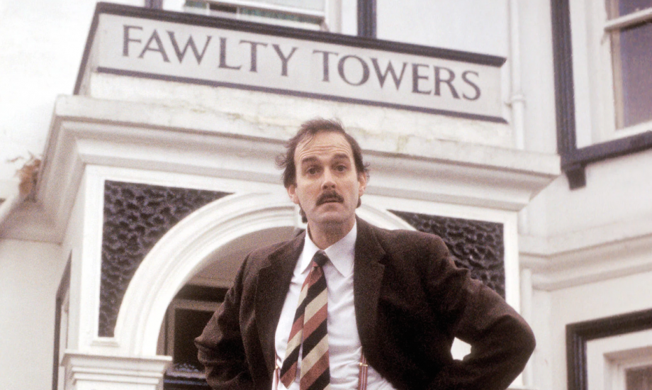 John Cleese as Basil Fawlty
