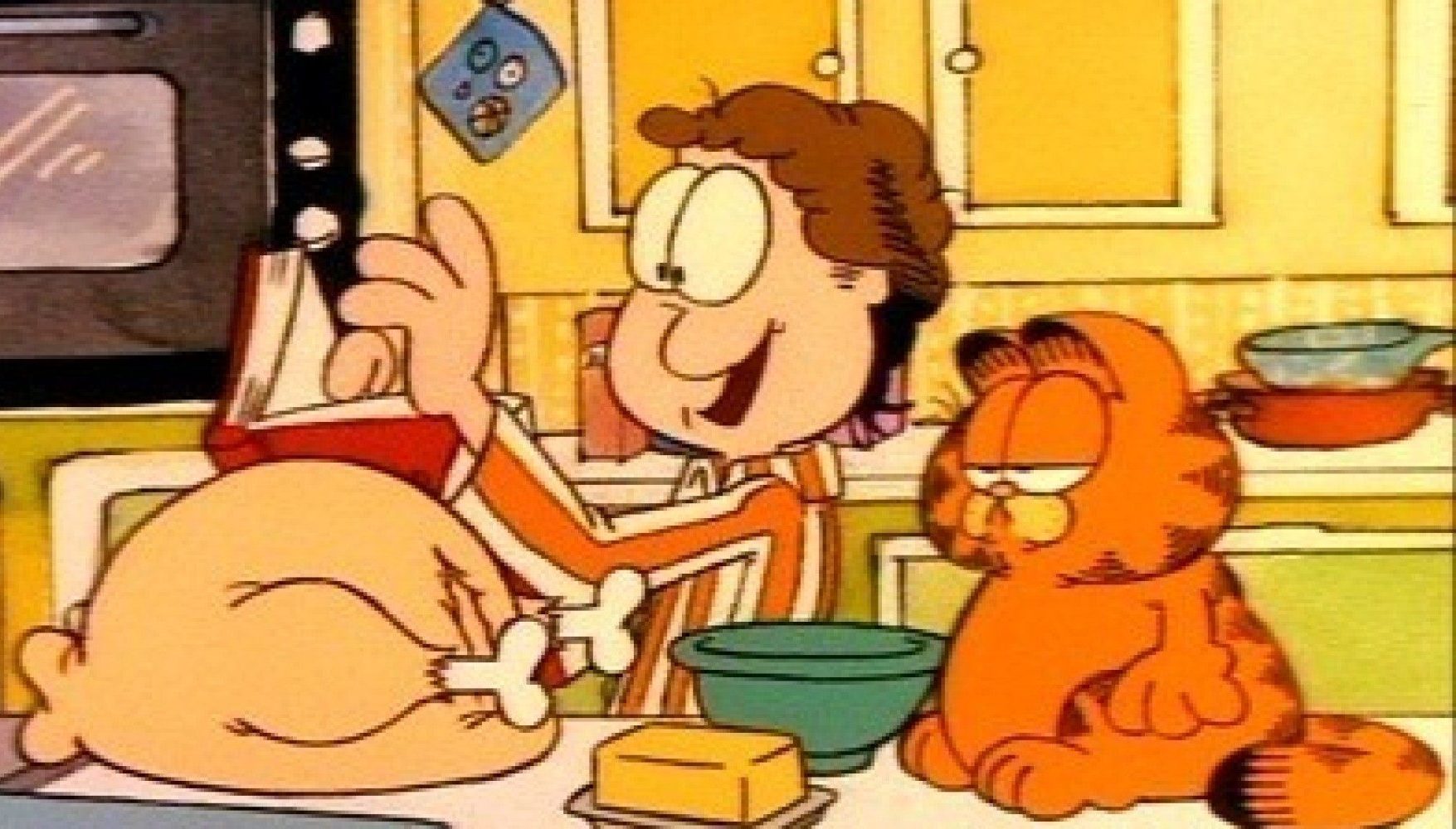 Jon Arbuckle and Garfield prepare a chicken dinner in Garfield and Friends