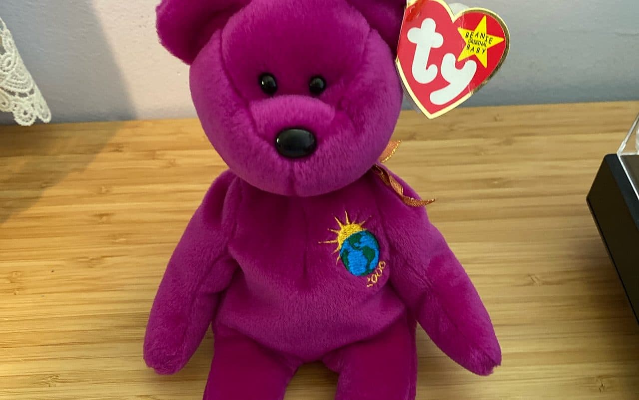 Millennium Beanie Baby - purple with an Earth on its lapel